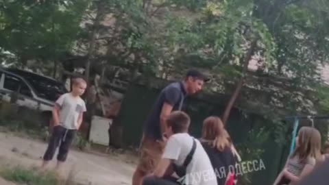 Ukrainian soldier in Odessa fights a little girl... Defender of the people?