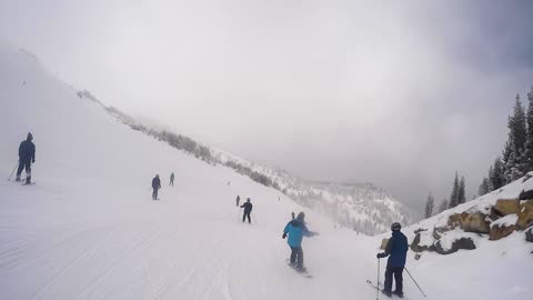 People Skiing and Snowboarding