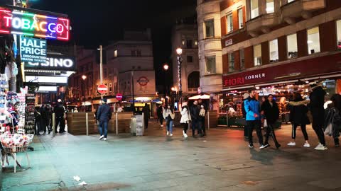 video people walking on s commercial street at nigh