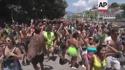 Brazilians take to streets as Carnival postponed