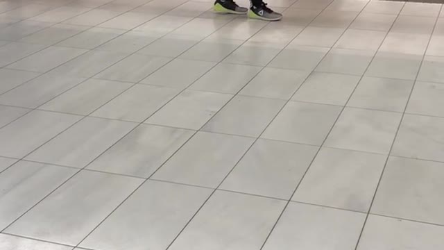 Blue jacket guy waves fencing sword around on subway terminal