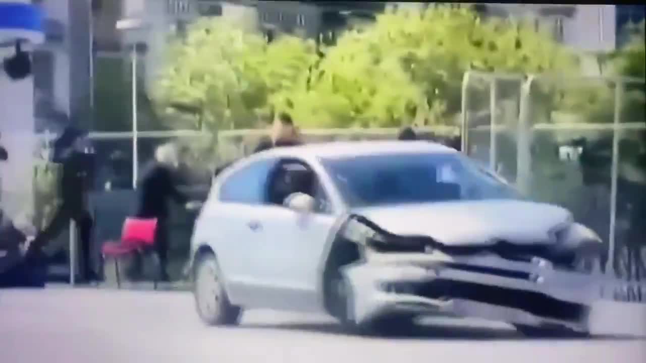 Man jumps through car window to stop dangerous driver in Albania