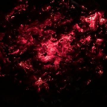 The glow of the embers from a fire