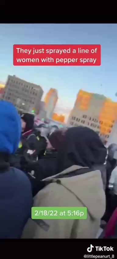 Ottawa - Police Pepper spray line of peaceful women - Trudeau's Stasi Officers