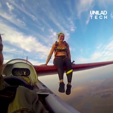 Woman Skydives Off the Wing of A Glider