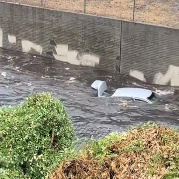 Los Angeles Area: Cars get washed away by Hurricane Hillary flooding