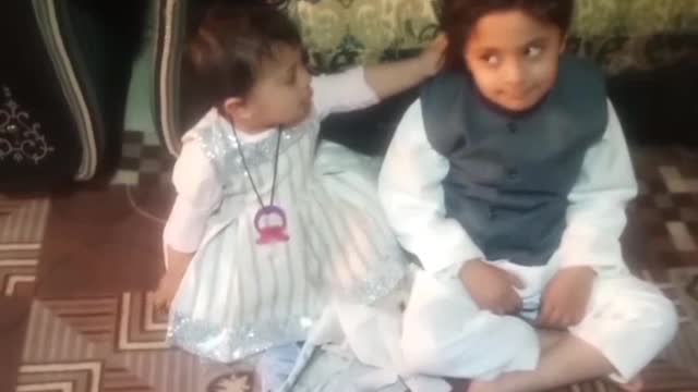 Little Sister pulling her brother ear and his reaction qas hilarious😂