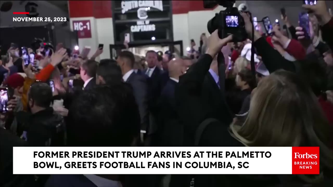 BREAKING NEWS- Former President Trump Arrives At Palmetto Bowl In SC, Crowd Chants 'USA! USA!'