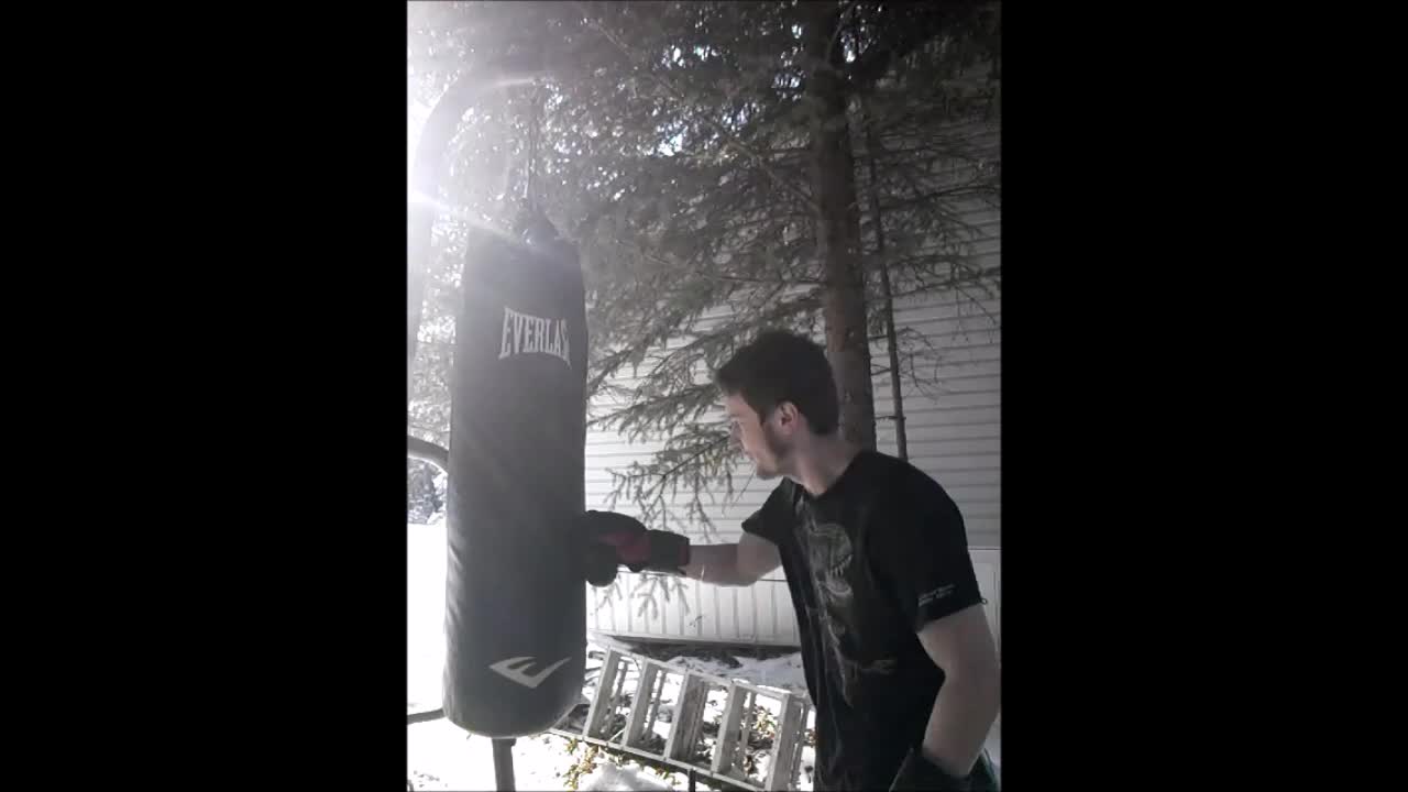 Hitting Frozen Solid Everlast Heavy Bag with 16oz gloves Part 2
