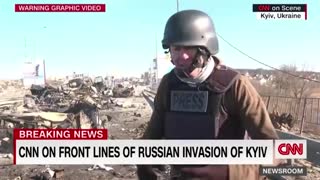 CNN Reporter Sits Next To Grenade Before Moving