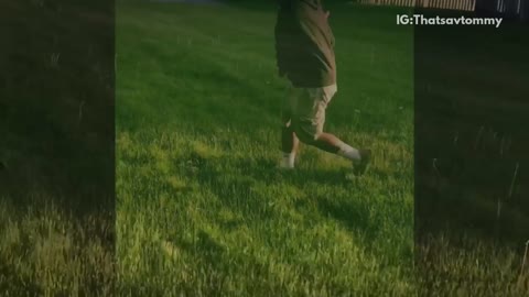 Music red bat guy hits ipad in grass field