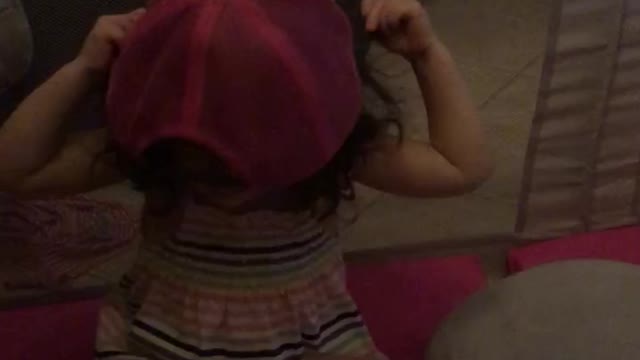 Fixing my hair for my hat