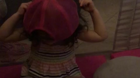 Fixing my hair for my hat