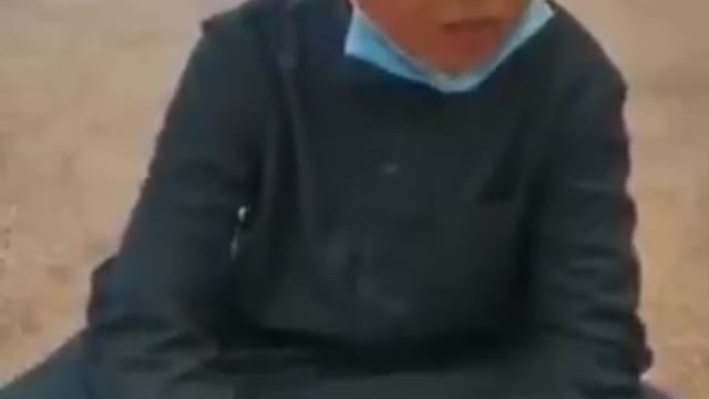 A child reads the Quran in a beautiful voice