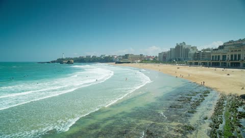 Ocean waves bursting on the shore of the coast