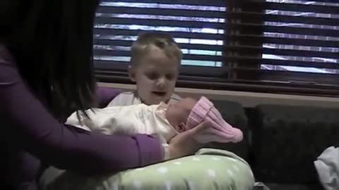 Baby meets sister and asks the funniest question!