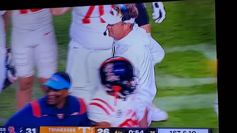 TENNESSEE FANS ATTACK OLE MISS WITH GOLF BALLS WATER BOTTLES,& OTHER THINGS