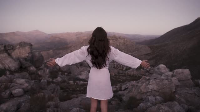 A Woman Raising Her Hands