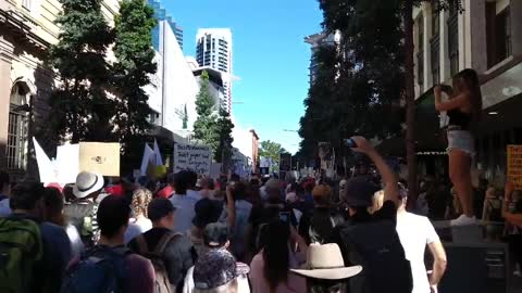 FREE VICTORIA" - Anti-vaccine mandate protesters marched through Brisbane, Australia on Saturday