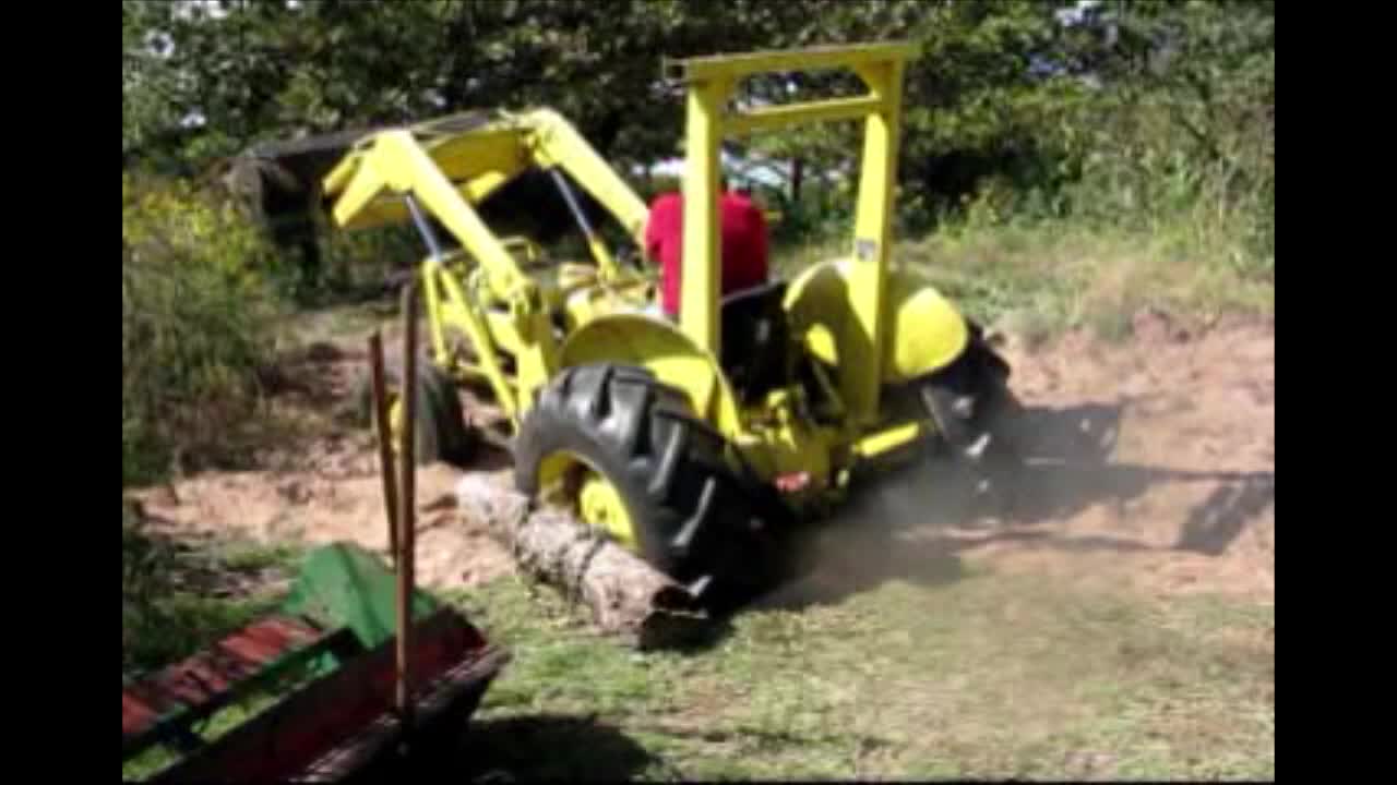 Man Accidentally Buries Self And Tractor In Sand