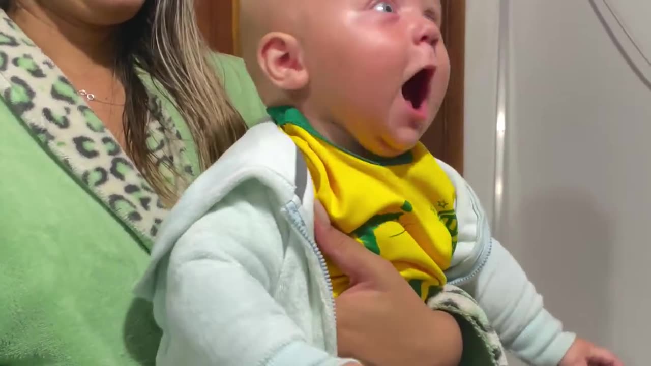 5-Month-Old Son Imitates His Father's Show of Strength