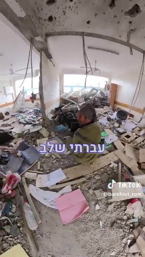 Israeli occupation soldiers occupy a UN school building in Gaza.