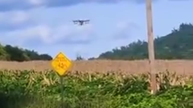 A drone flies in and sprays this farmers field without asking the farmer