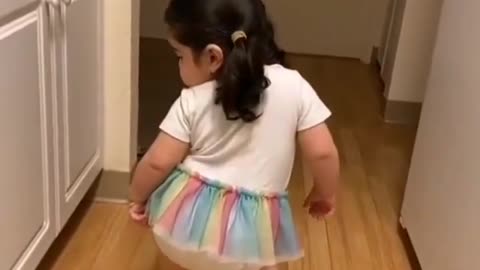 Baby girl mimics old mommy