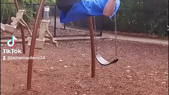 Having Fun On Swing