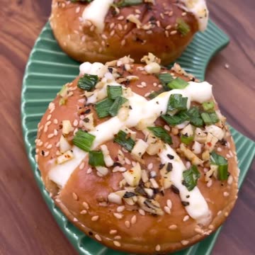 "Delectable Delights: Dive into the World of Korean Cream Cheese Buns with an Extra Cheesy Twist!"