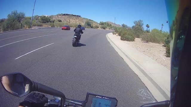 Biker Busts Through Wall