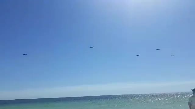 10 military choppers flying the coast Ft Walton FL