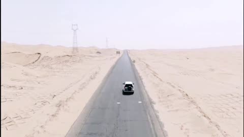 A car that travels alone in the desert, loves life and loves aerial photography