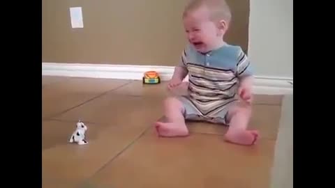 Funny Baby scary with a cow toy