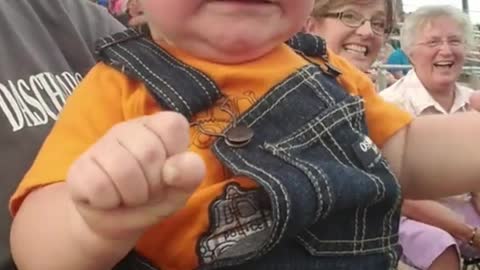 A baby boy Got Shock Of Engine Of Zoom Passing Car