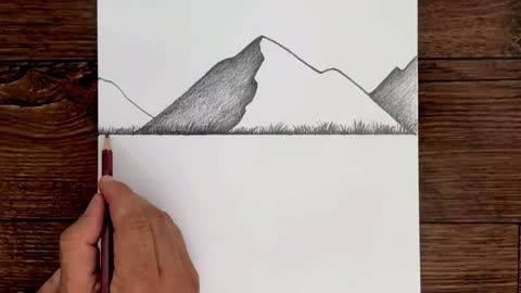 Finish drawing the lawn at the foot of the mountain
