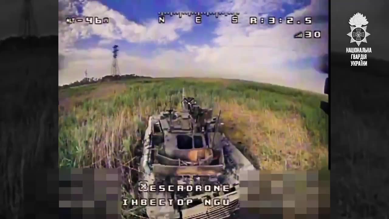 Ukrainian Drone Drops Explosive Charge into Disabled Russian Tank