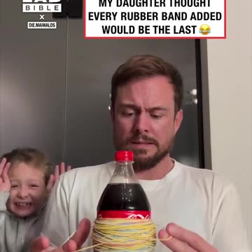 Father and daughter anticipate a soda bottle explosion while adding rubber bands 😳