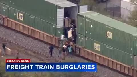 150 people or more are actively looting and breaking into cargo train on the west side of Chicago