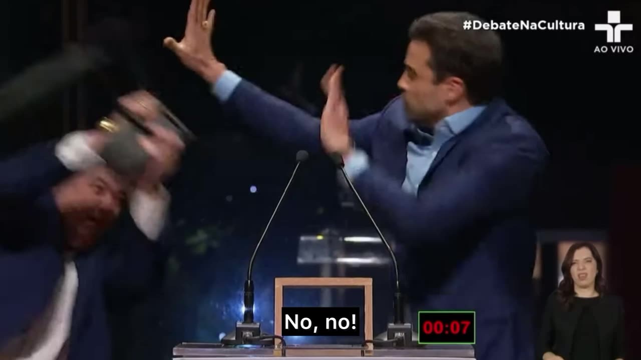 UNBELIEVABLE! Candidate Attacks Opponent with a Chair During Live TV Debate in Brazil