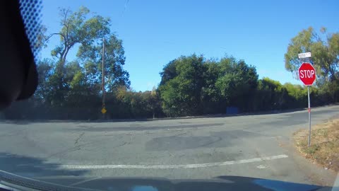 Semi-Truck Gets High Centered Pulling into Street