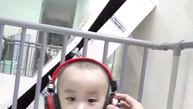 Cute baby listening music