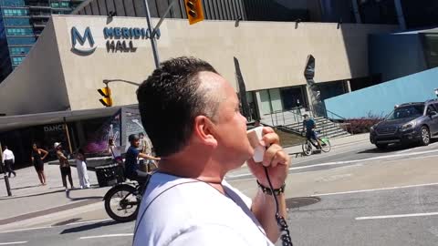 Street preachers leading the Toronto freedom march, September 4, 2021