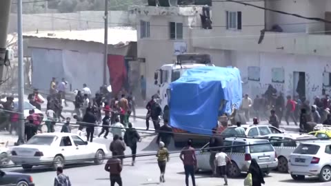 Aid convoy enters Gaza through the Rafah crossing