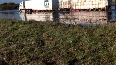 Road Train Crossing Wetlands in Australia