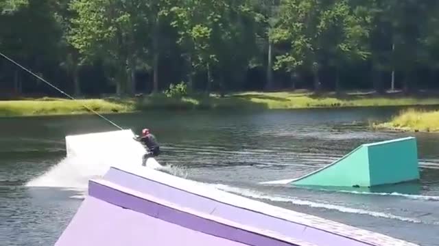 Yellow wakeboard white ramp fail