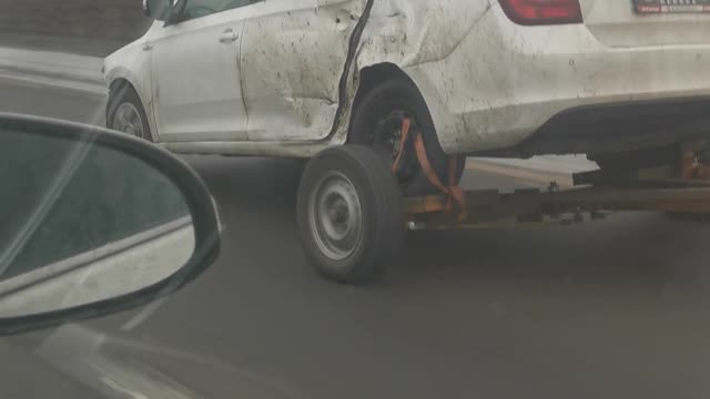 Car Using Trailer for Back Tires