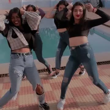 Girl dancing in swimming pool