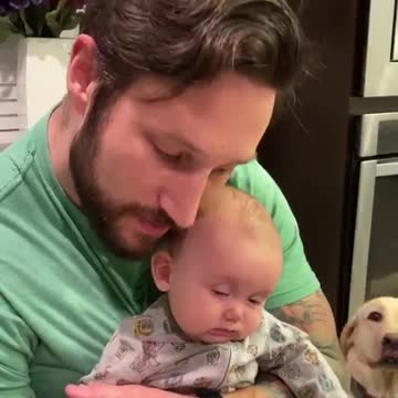Watch this dad use his beard to put the baby to sleep
