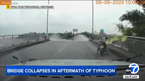 Dashcam shows a bridge collapse in Vietnam following a deadly typhoon